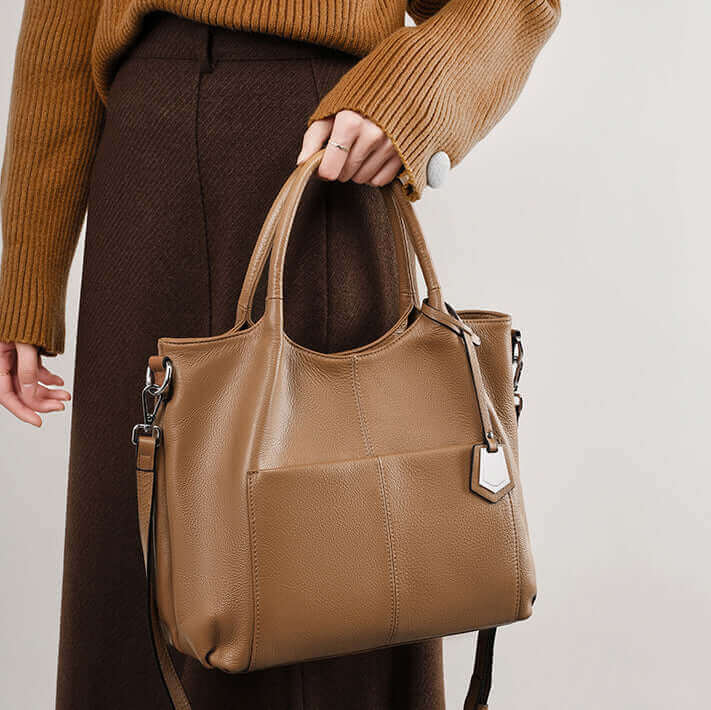 Elegant brown leather handbag with shoulder strap, shown from different angles