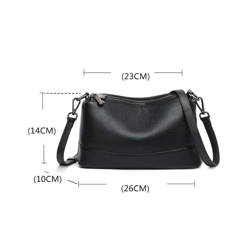 Black leather crossbody bag size display.