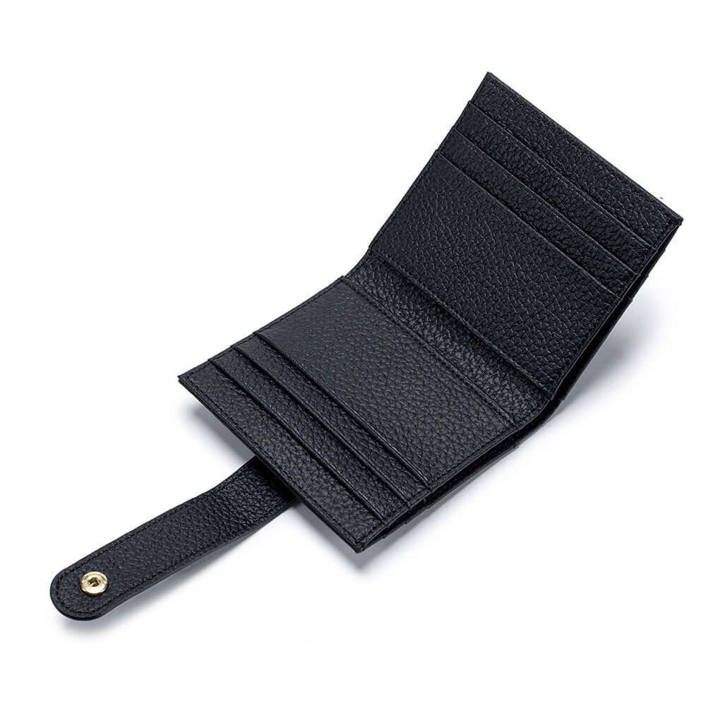 Black slim wallet opened showing card and money slots