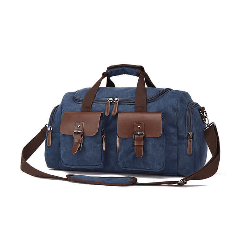 Durable canvas weekend travel bag featuring spacious compartments and adjustable shoulder strap.