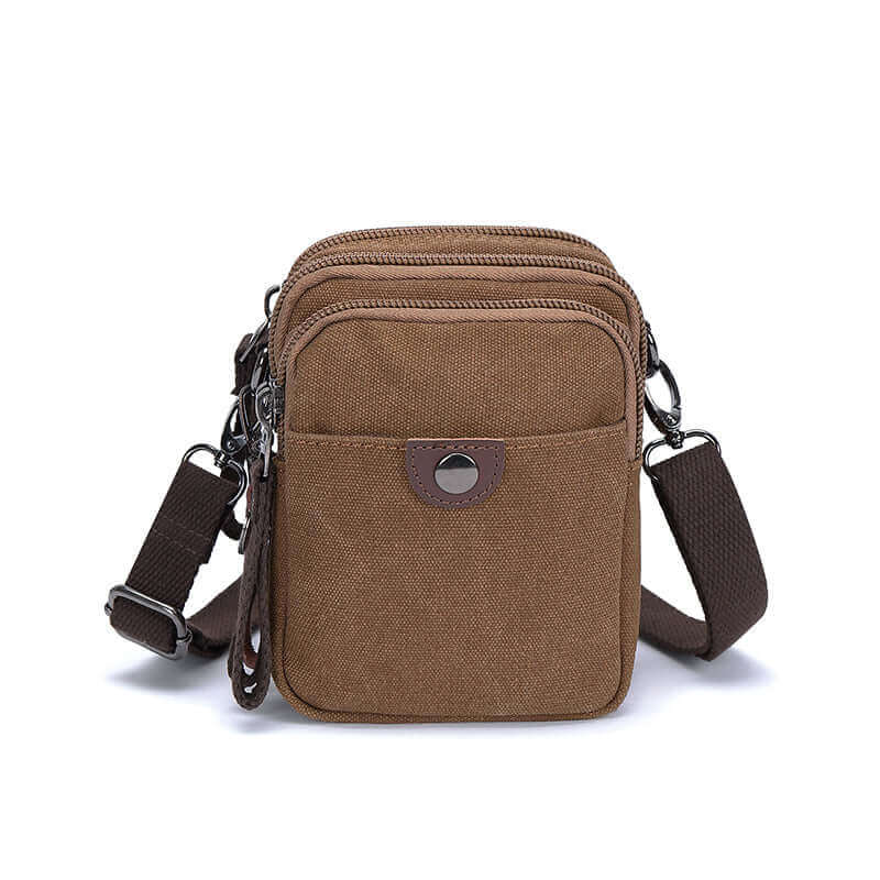 Front view of the coffee canvas small crossbody bag with waist clip.