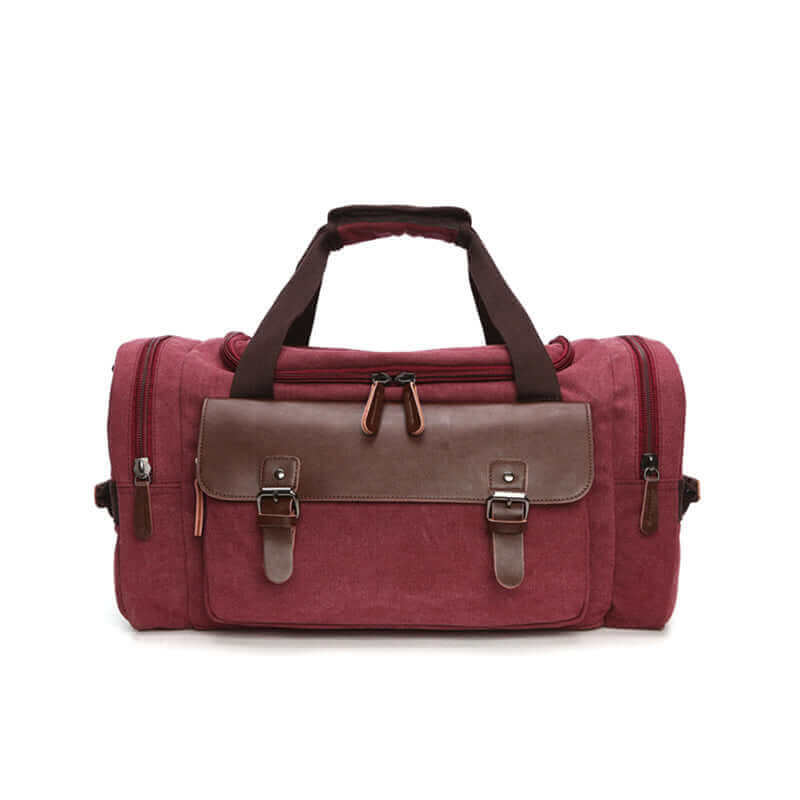 Spacious canvas overnight bag with leather flaps and secure zippers.