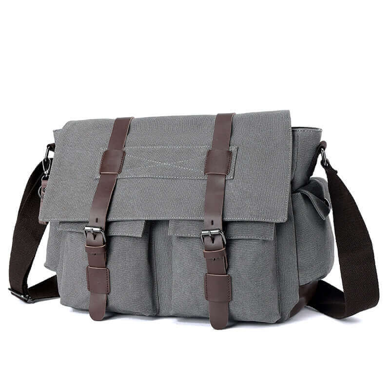 Interior view of the men's canvas messenger bag displaying multiple pockets for organization.