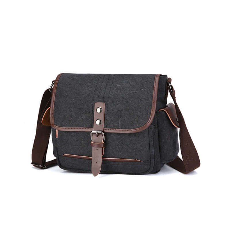 Vintage canvas crossbody bag with adjustable strap and secure flap closure.