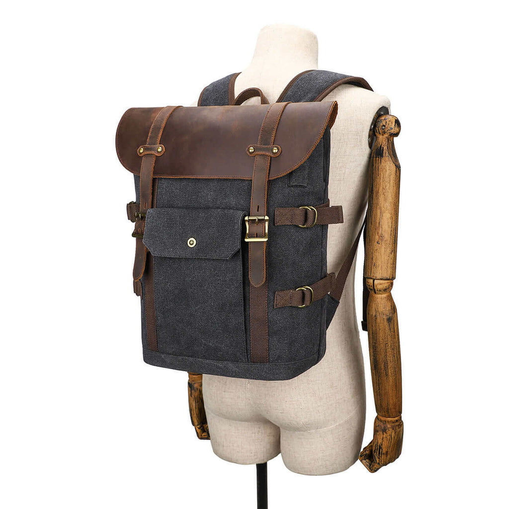 Durable canvas backpack with a dedicated laptop compartment for secure storage.