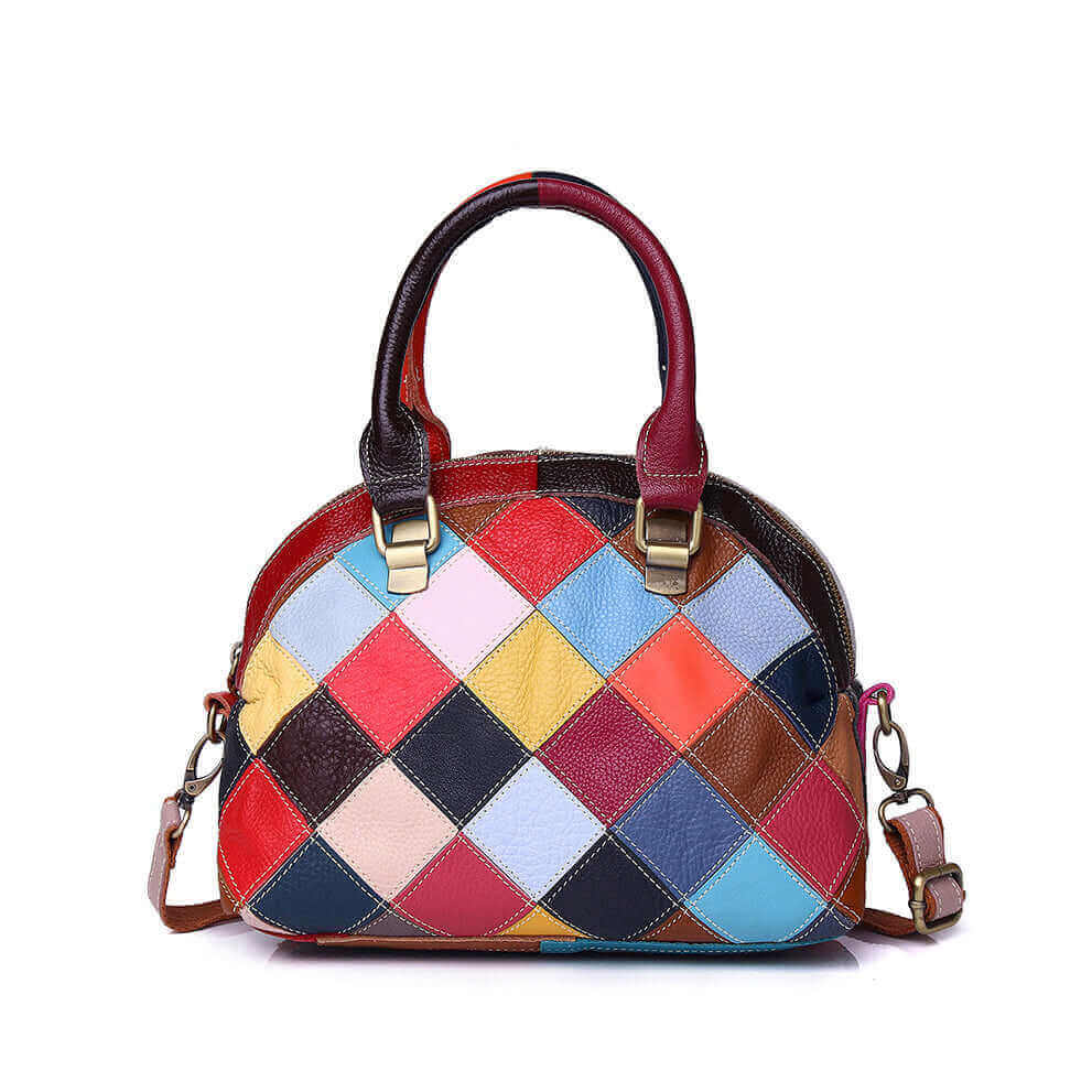 Leather handbag with a multicolor patchwork design and an adjustable strap.