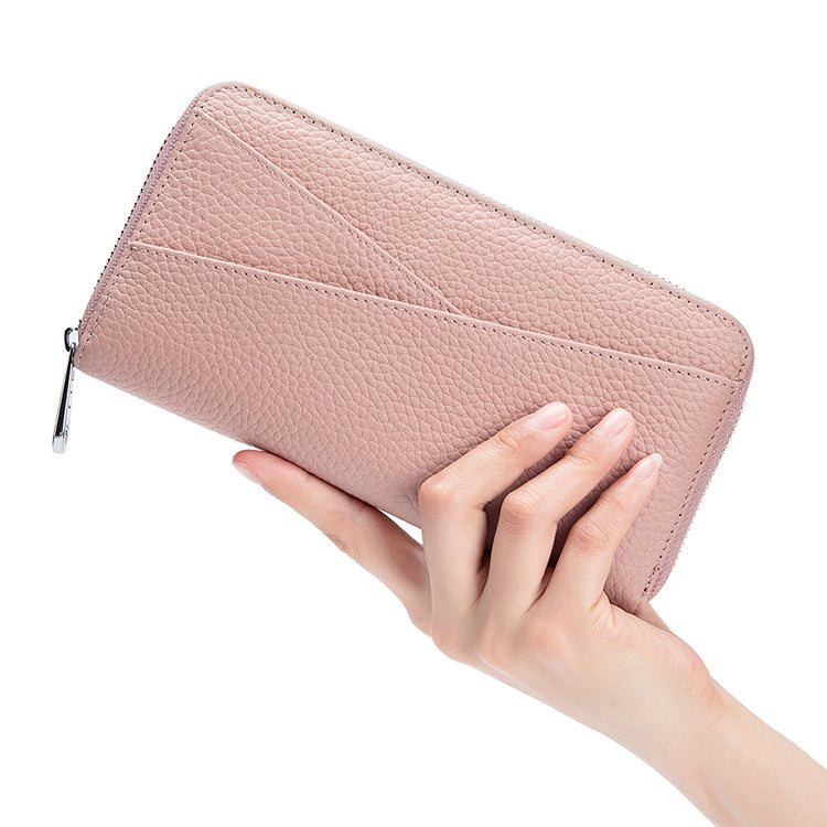 Pink RFID leather wallet with secure zipper closure and organized compartments.