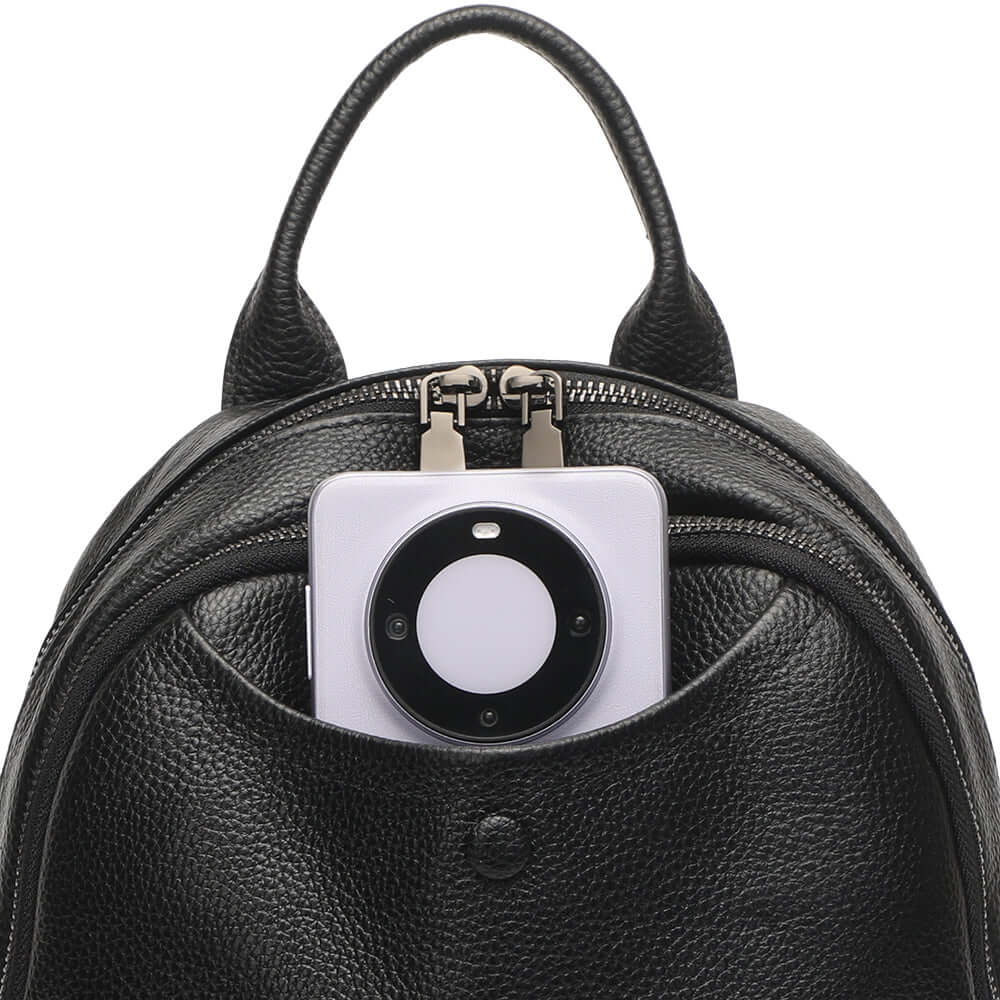 Front pocket of the black leather backpack