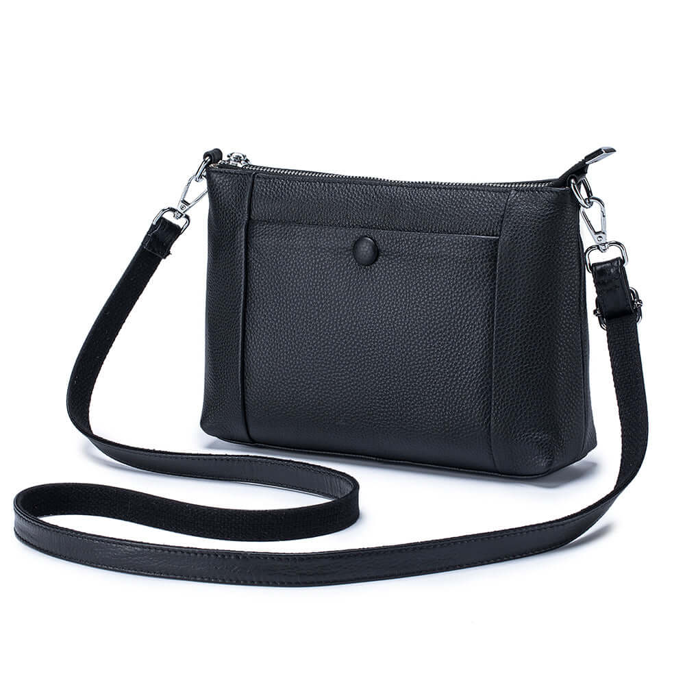 Black leather crossbody bag with adjustable strap for versatile wear.