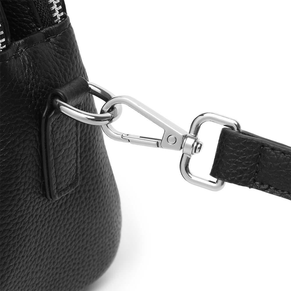 Details of the black leather bag.