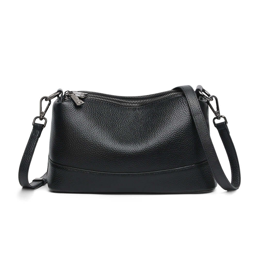 Front view of black leather crossbody bag.