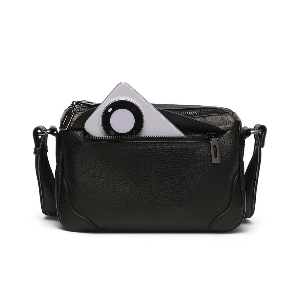 Black leather crossbody bag with a phone