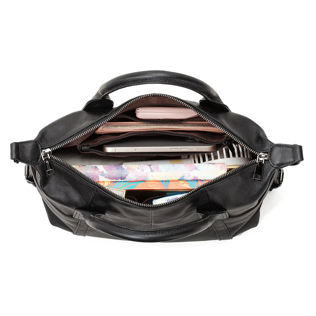 Black leather bag with interior items