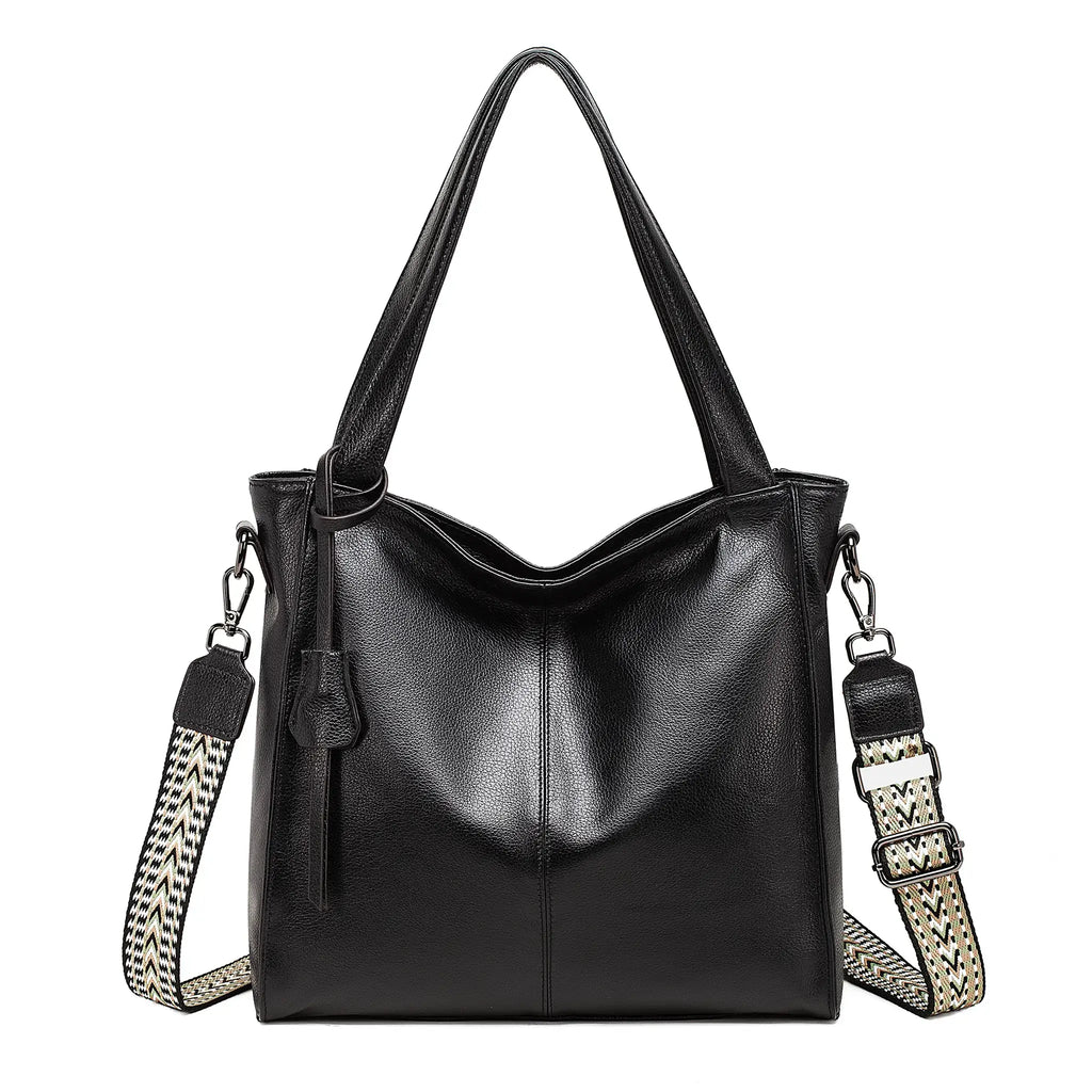 Front view of black soft leather tote bag with woven strap