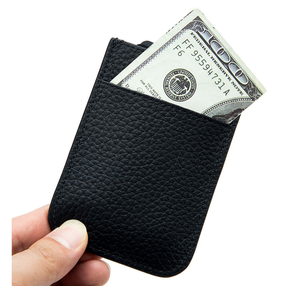 Black slim card holder with money in back slot and cards in front.