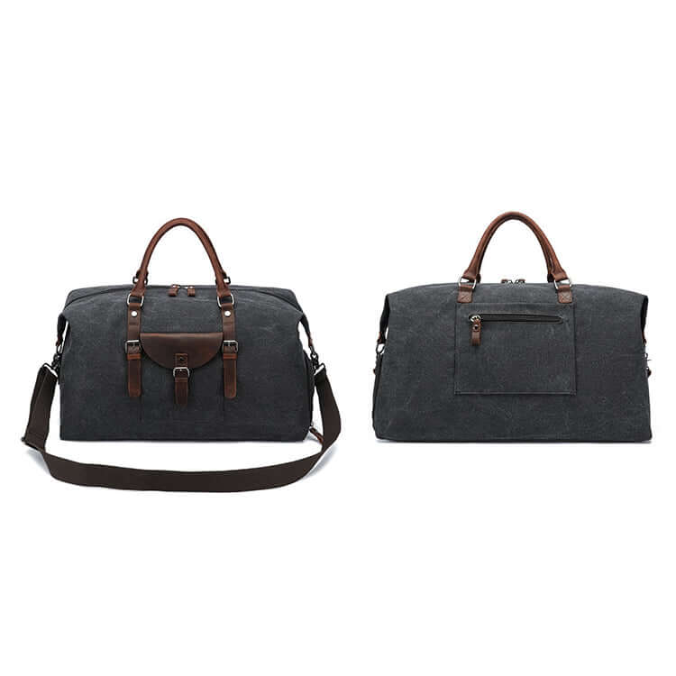 Black travel canvas duffle bag with brown handles and straps