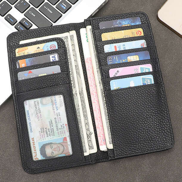 Interior of black bifold wallet with card slots and photo window.