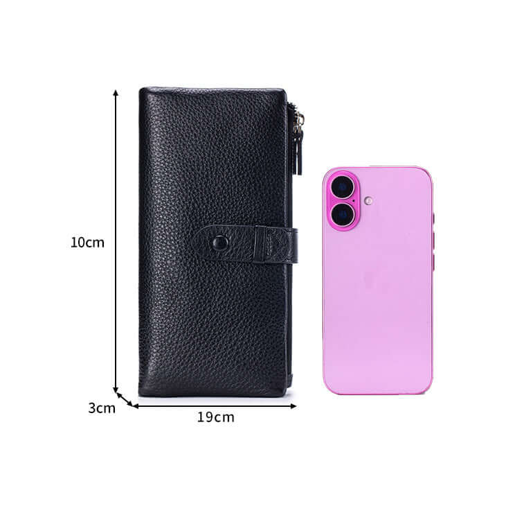 Black wallet with measurements and a pink phone for scale