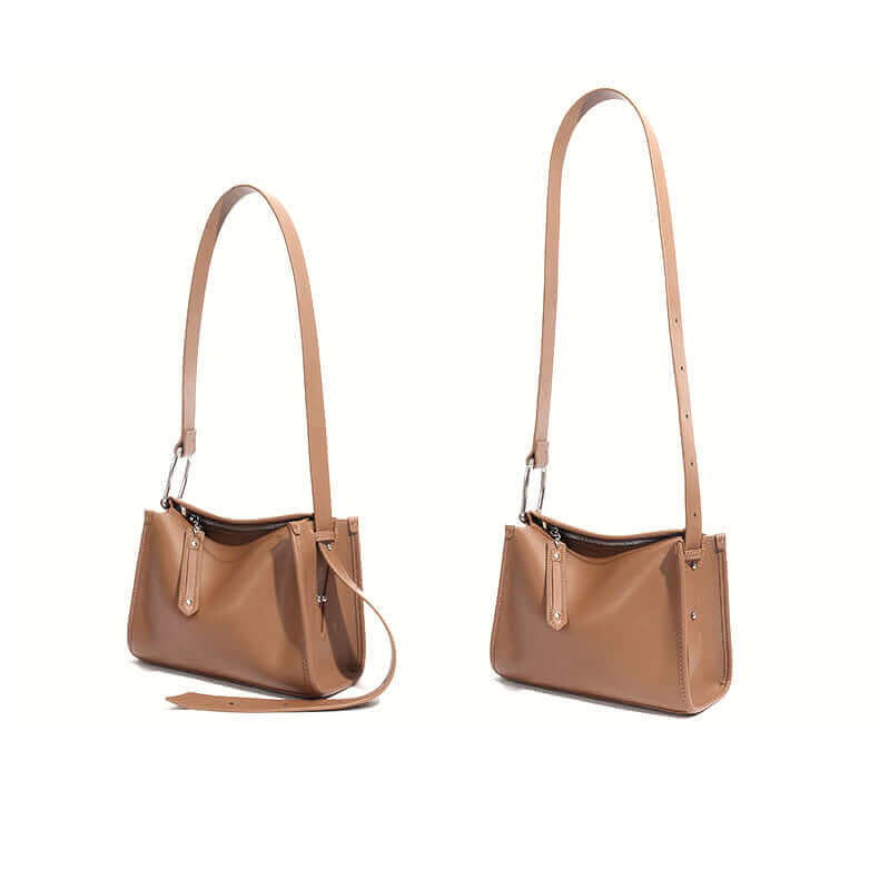 Adjustable wide strap on a soft leather shoulder bag for women.