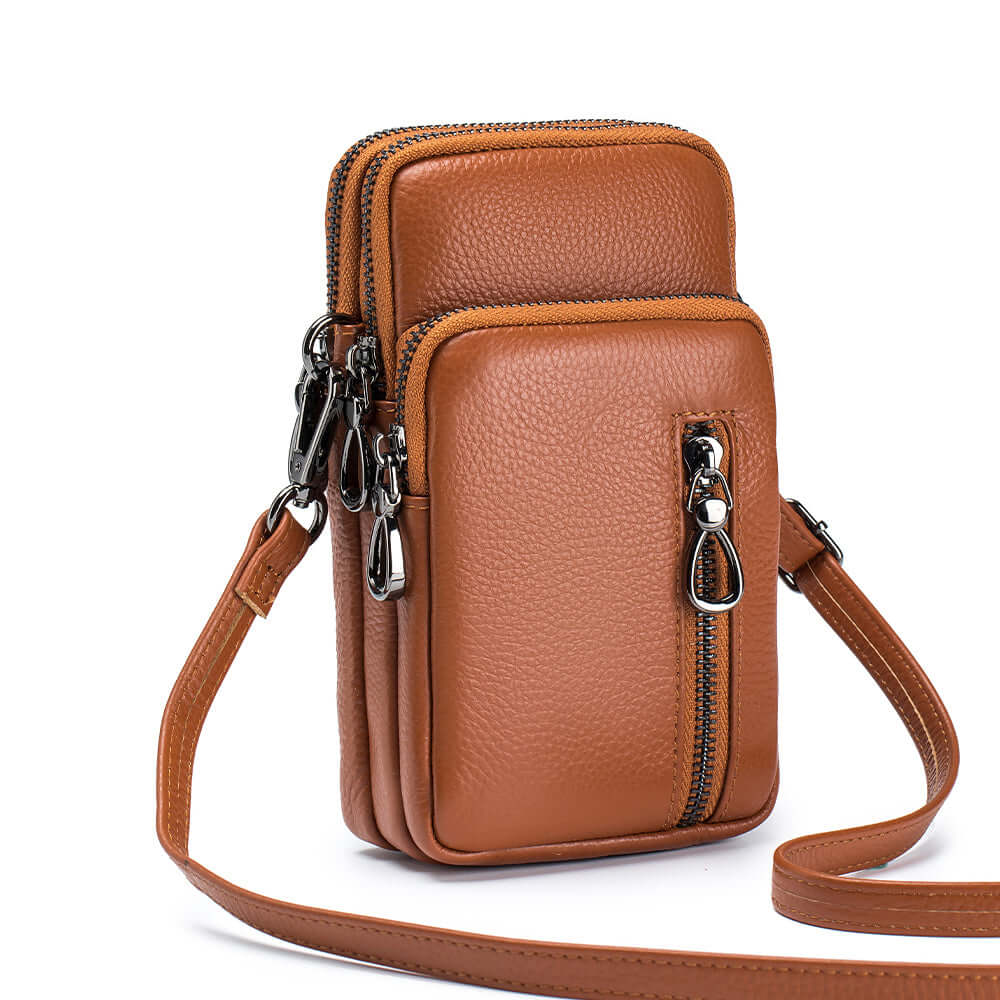 Compact leather crossbody bag, perfect for carrying your phone and essentials in style.