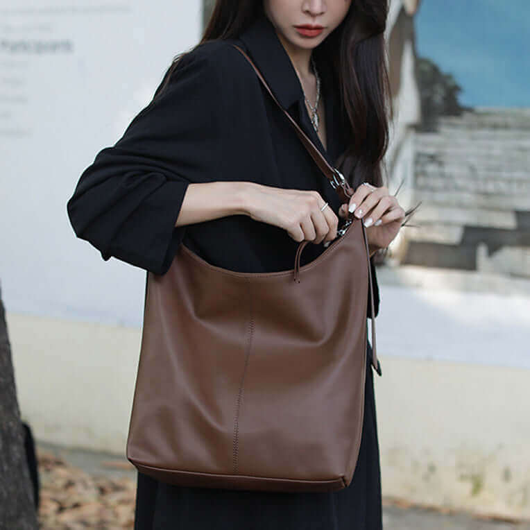 Spacious leather shoulder bag, ideal for work essentials.