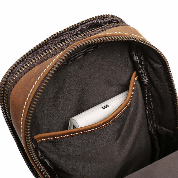 Brown leather pouch with a zipper