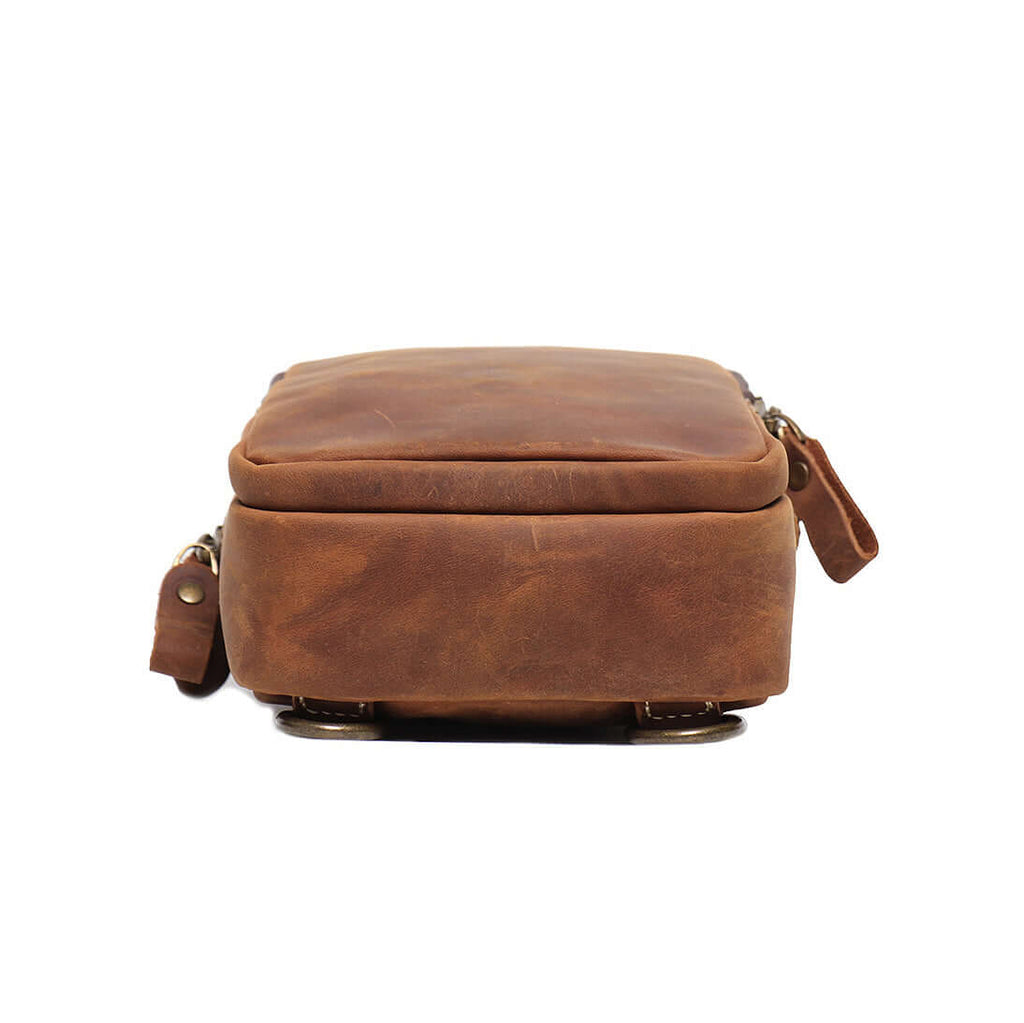 Brown leather sling crossbody bag