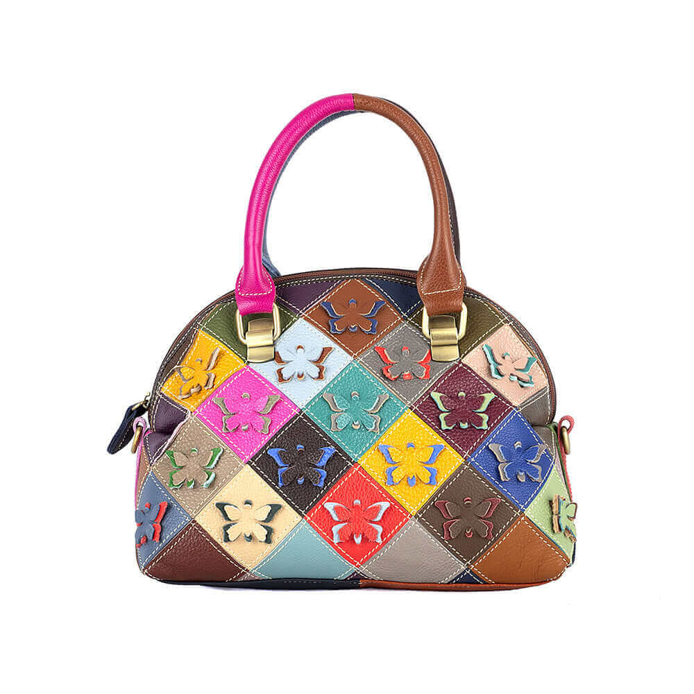 Front view of butterfly pattern leather handbag with colorful patchwork.