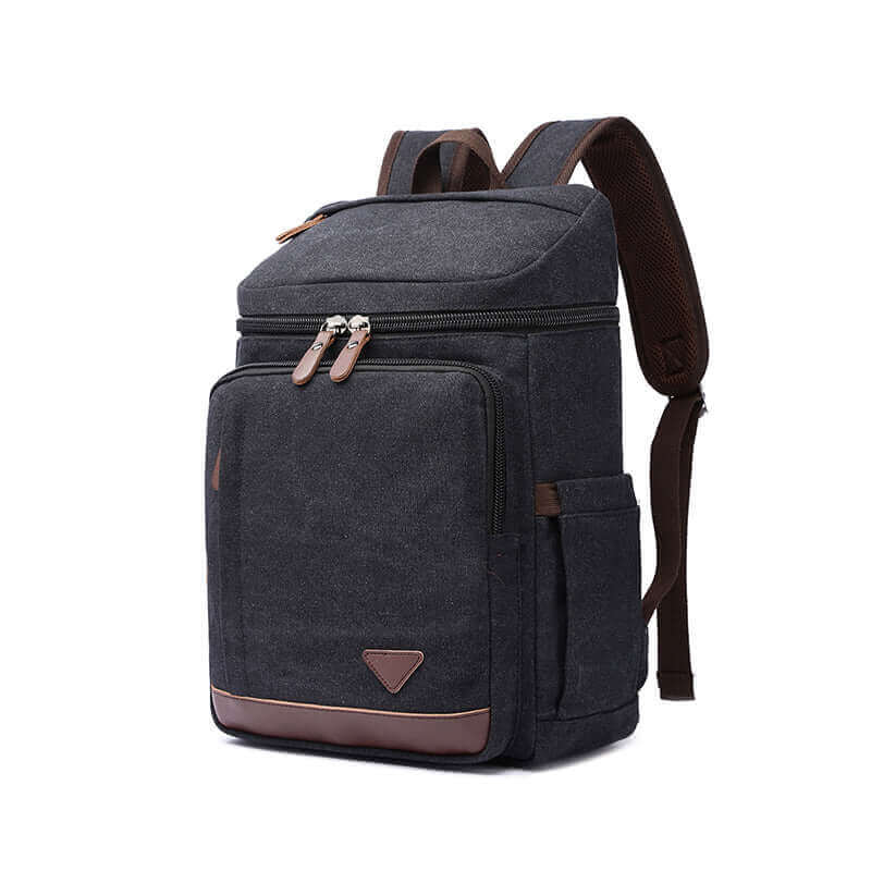 Canvas backpack with laptop compartment for 15.6-inch laptops, suitable for work and travel.