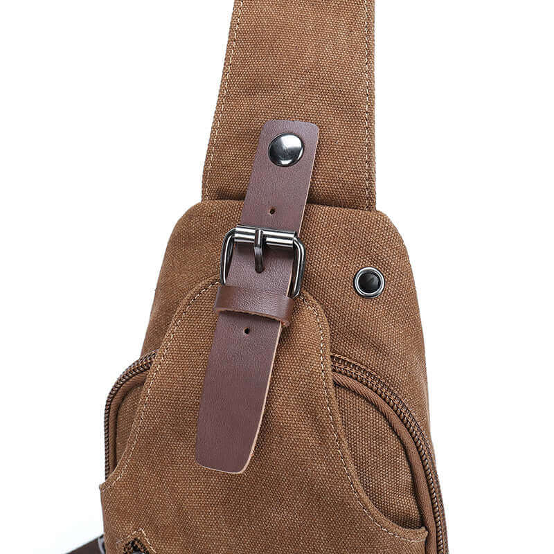 Details of the canvas crossbody bag.