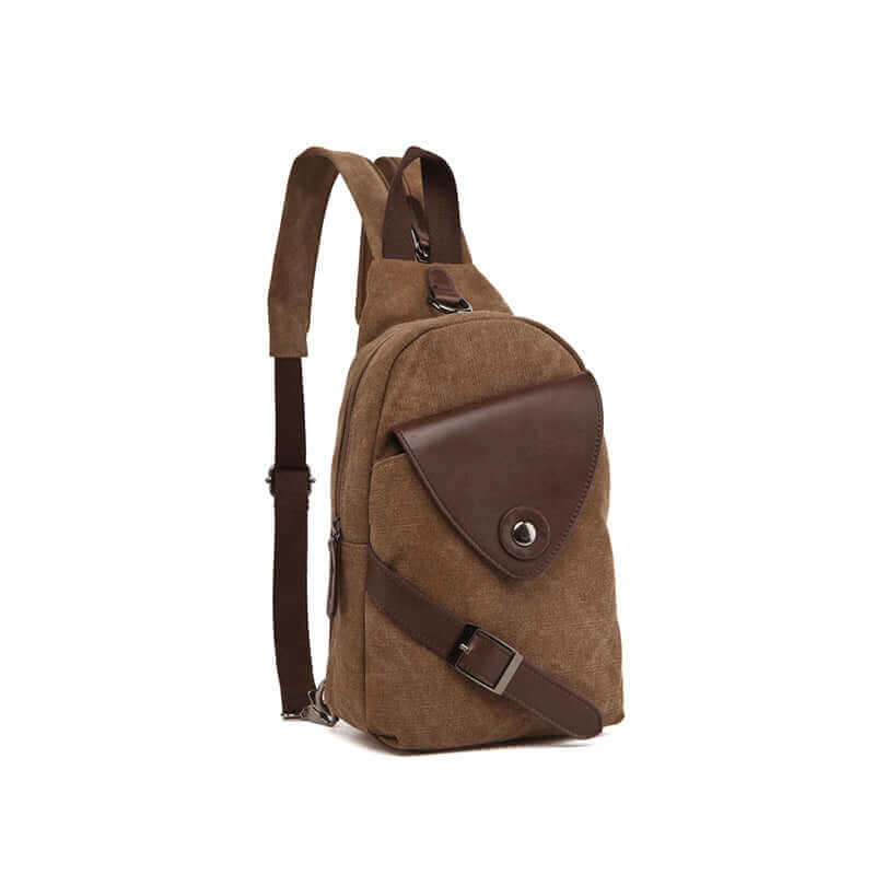 Canvas crossbody sling bag in brown, front view showcasing the compact and stylish design.