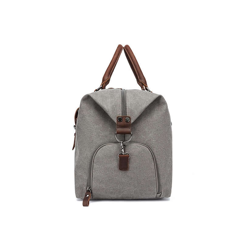 Grey duffle side view with leather accents
