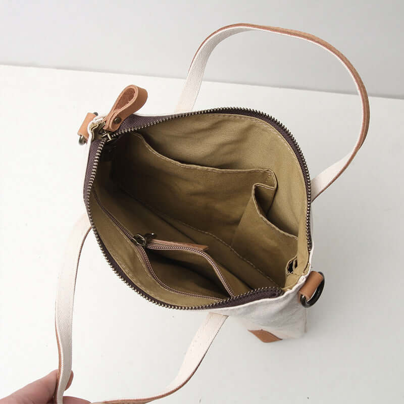 Inside view showing pockets and zipper compartment.