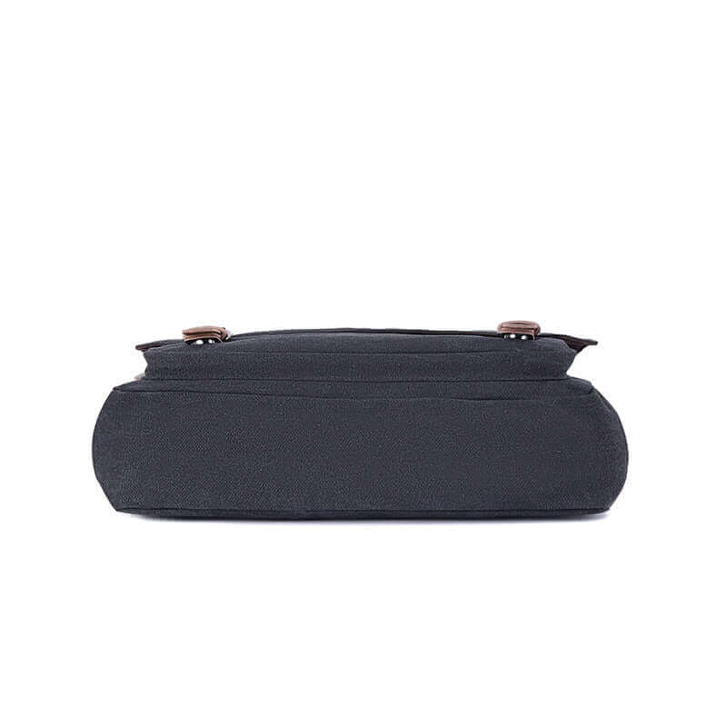 Bottom view of the black canvas laptop shoulder bag.