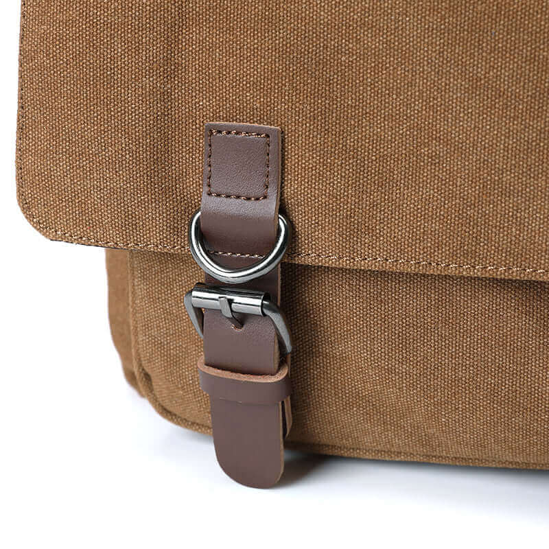 Details of the canvas messenger bag.
