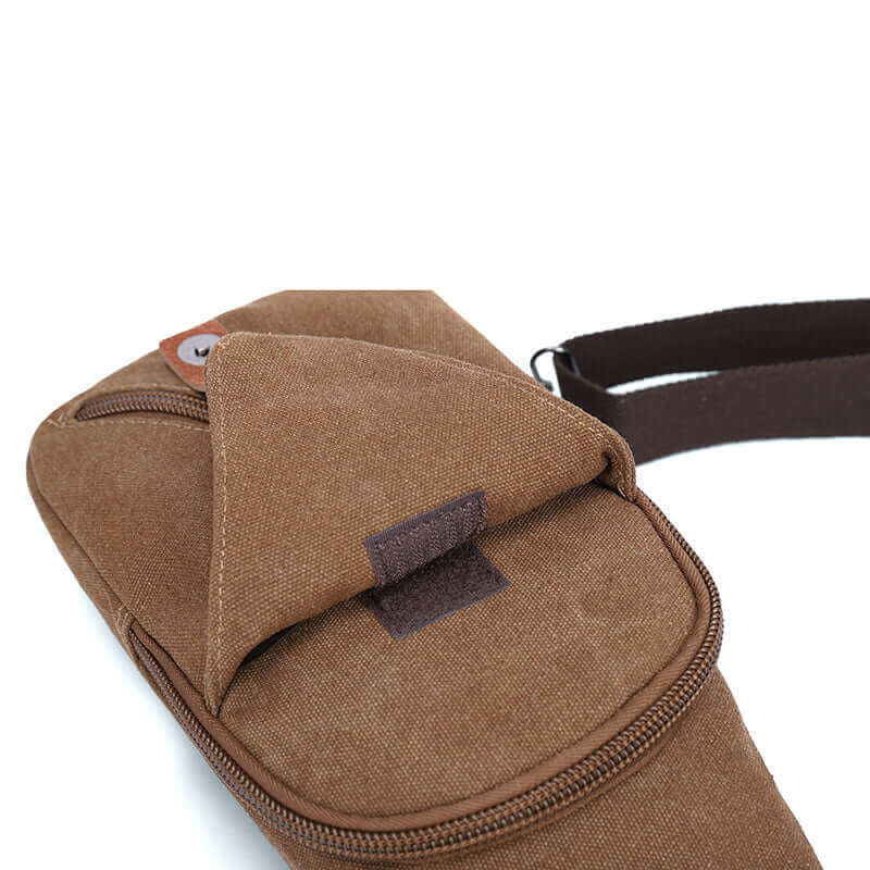 Details of the canvas crossbody sling bag.