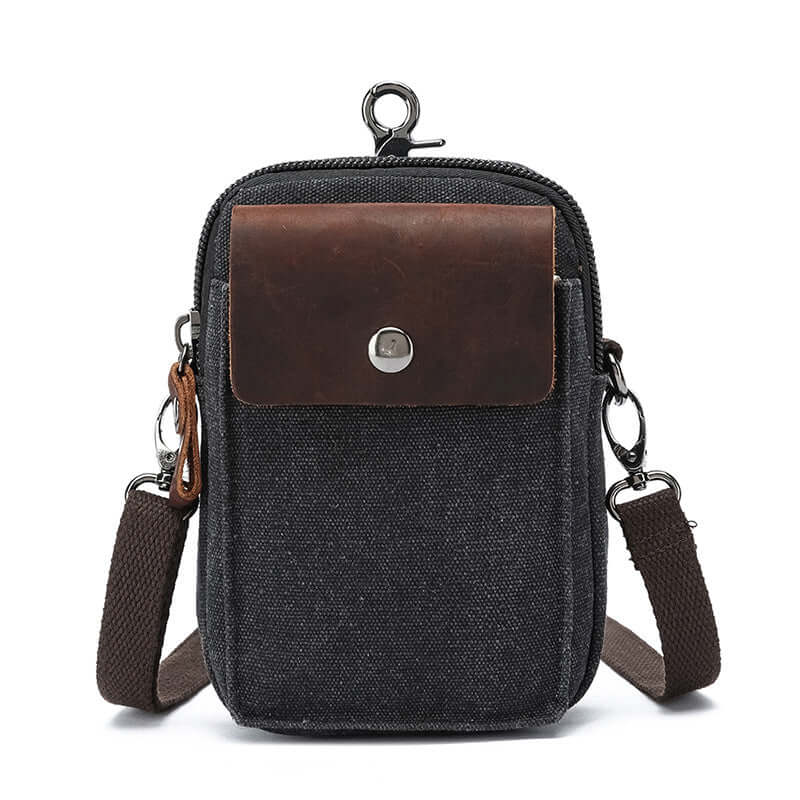 Black canvas small crossbody bag with leather flap – front view