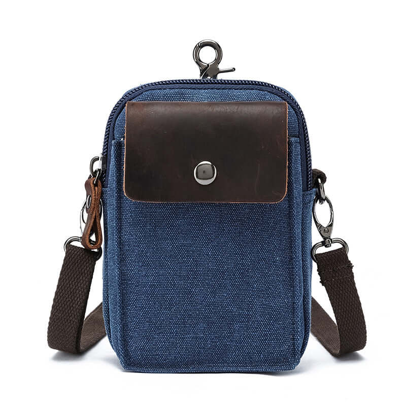 Blue canvas small crossbody bag with leather trim – front view
