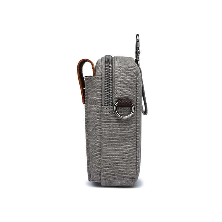 Grey canvas crossbody bag side view with strap