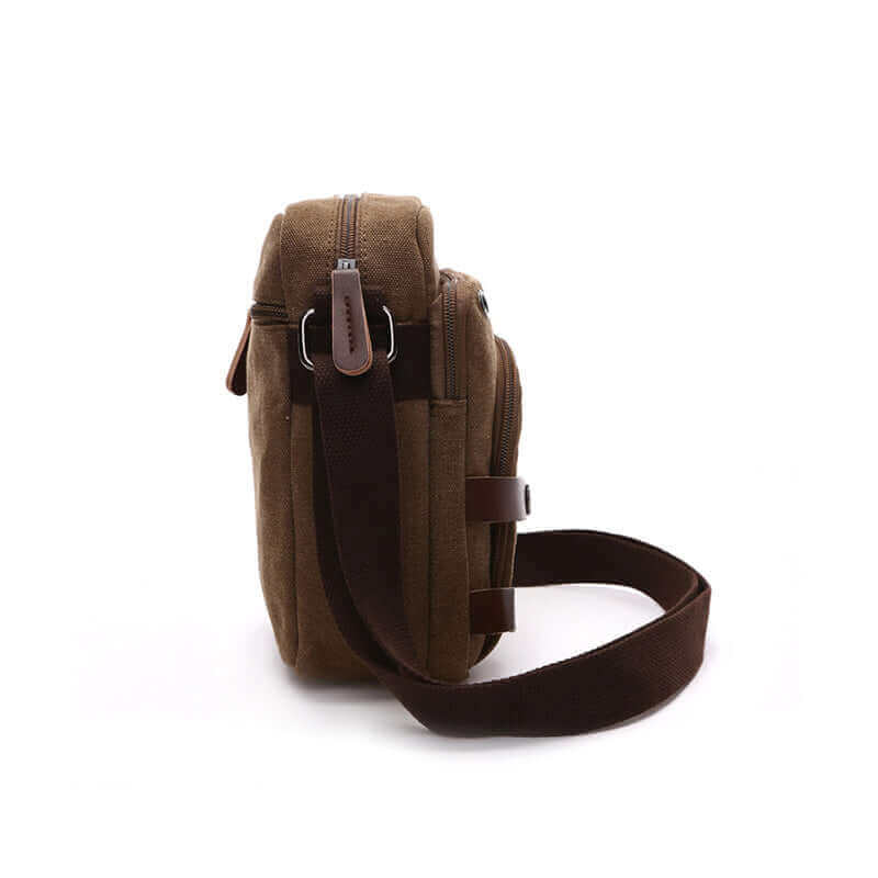 Side view of the canvas small crossbody bag.
