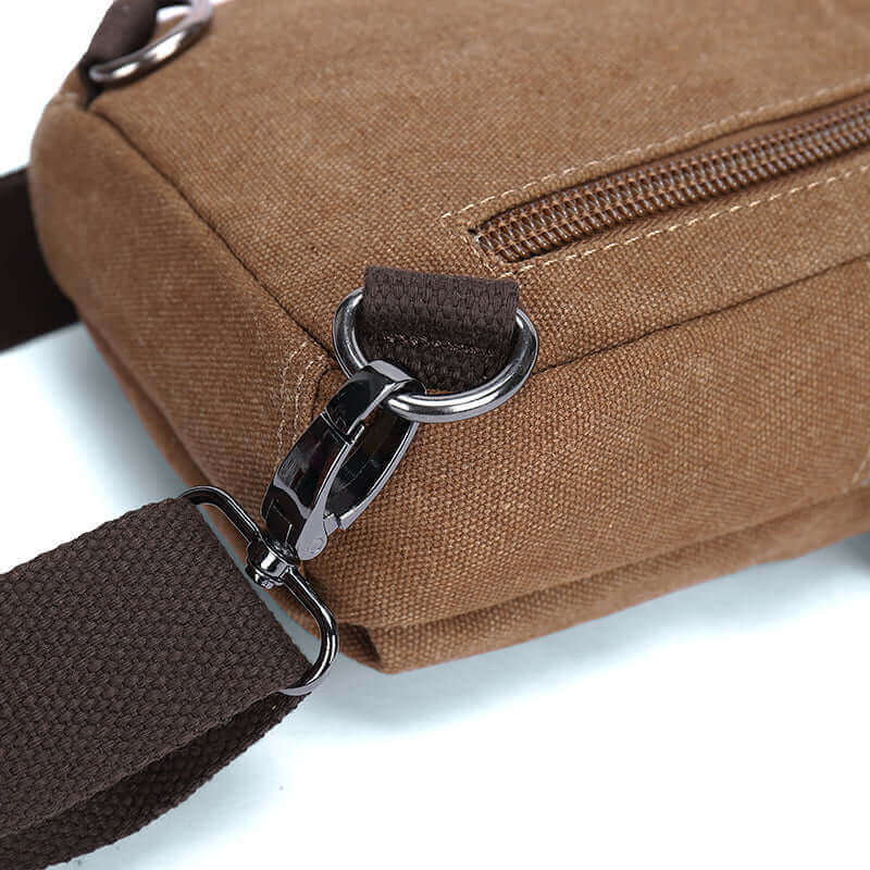 Details of the canvas small crossbody sling bag.