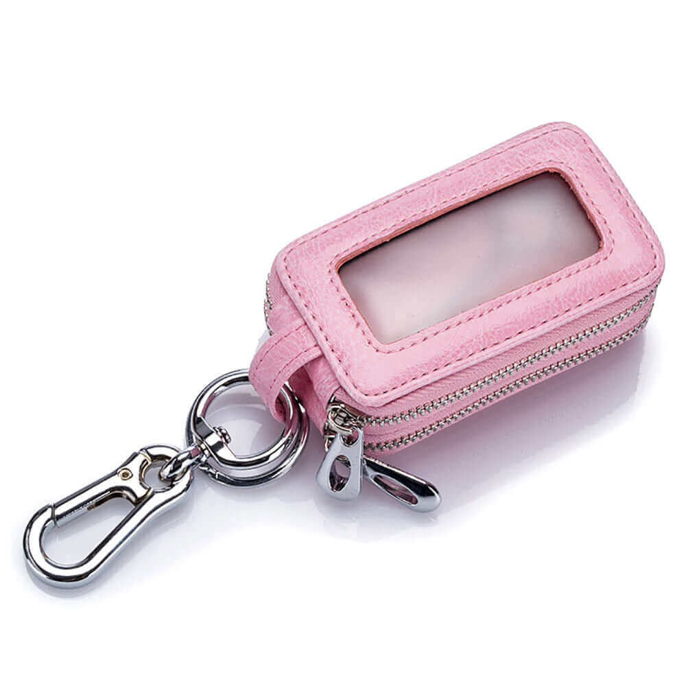 Leather car key case with a transparent window for remote keys.