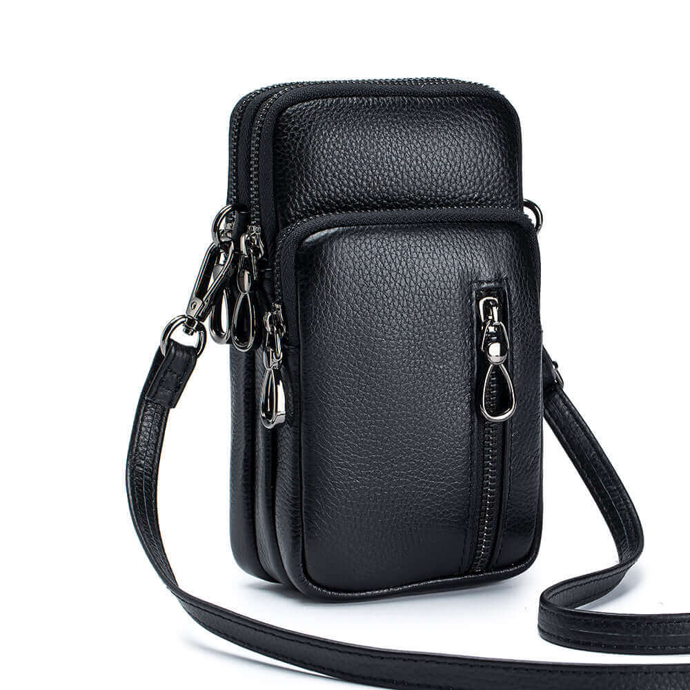 Chic leather mini phone crossbody bag for women, featuring multiple compartments and stylish design.