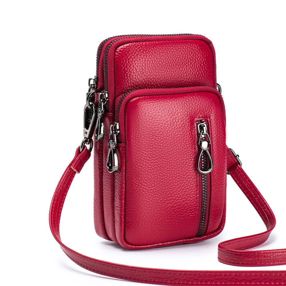 Chic leather mini phone crossbody bag for women, featuring multiple compartments and stylish design.