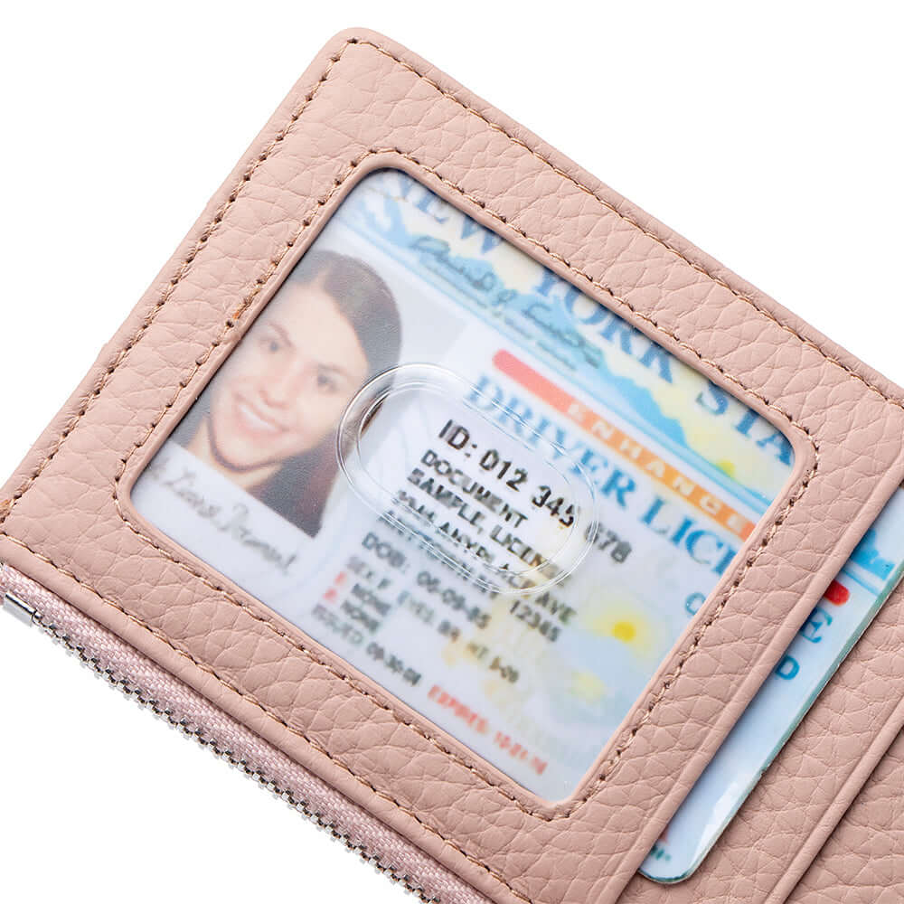 Pink wallet with a driver's license card inside