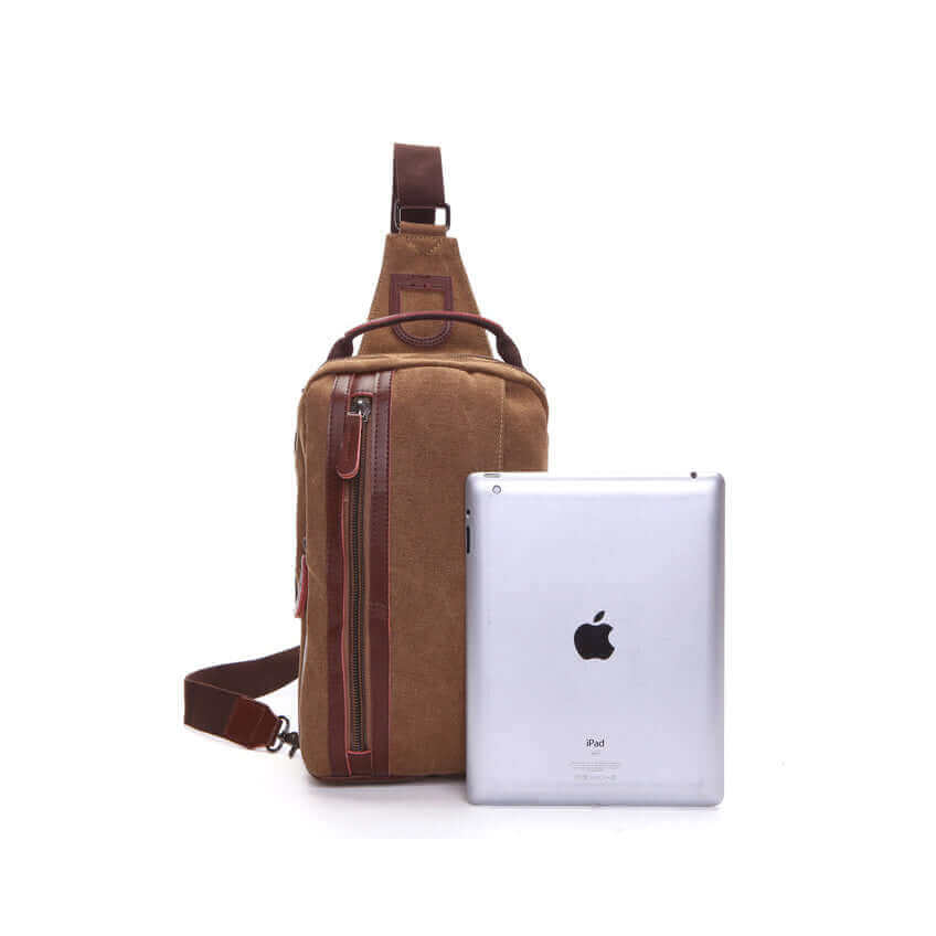 Coffee canvas sling bag with multiple compartments for organized storage.