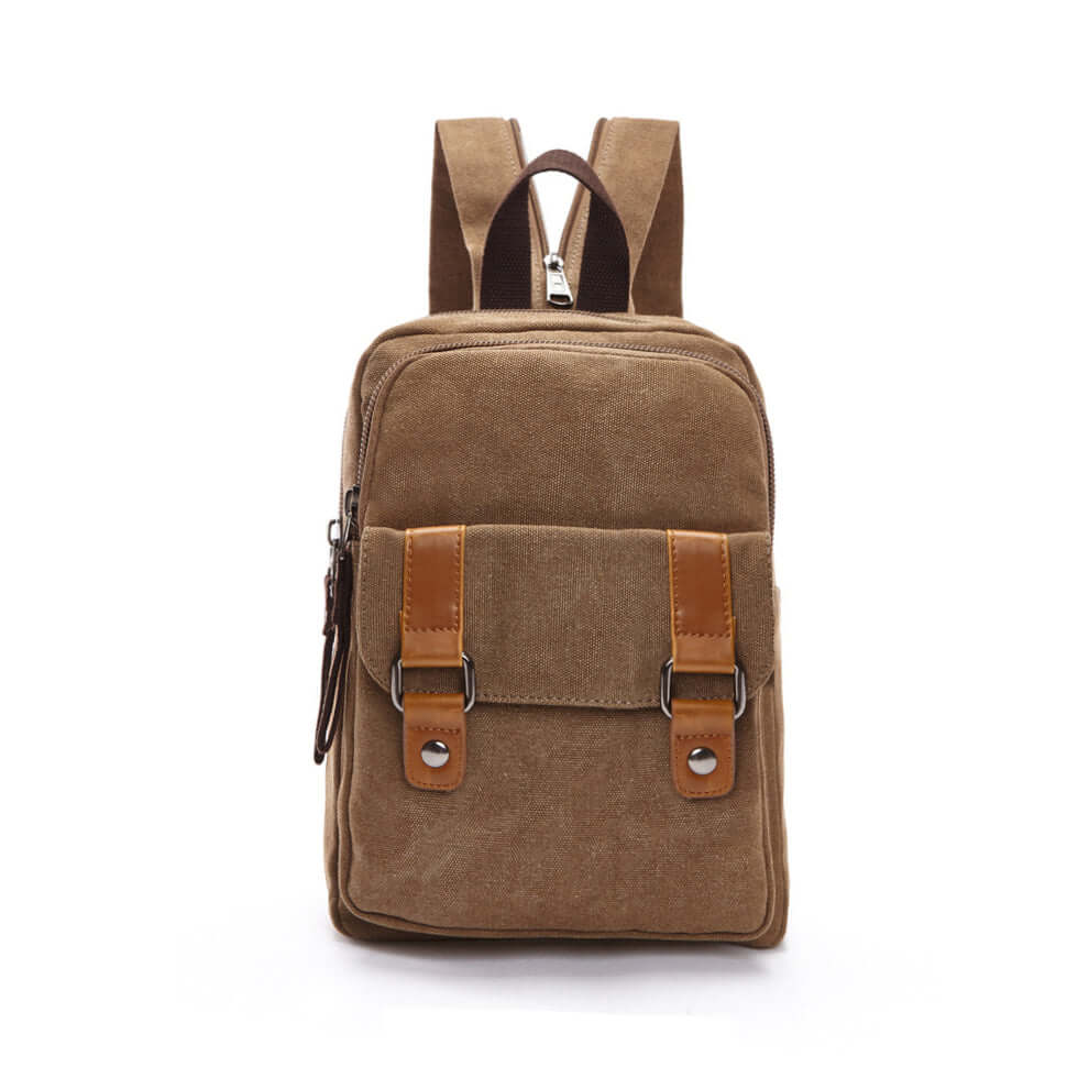 Coffee canvas backpack angled view showing structure and zippers