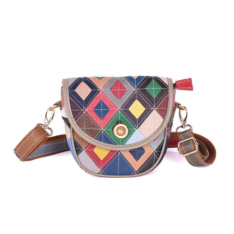 Front view of colorful leather saddle crossbody bag with quilted design.