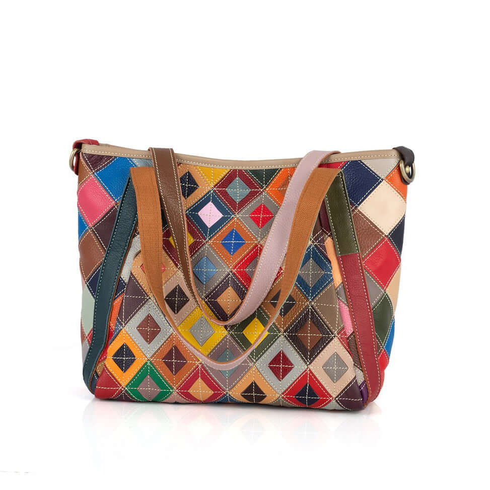 Front view of the colorful leather tote bag with a patchwork design.