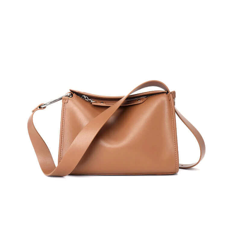 Comfortable women's leather shoulder bag with wide strap.